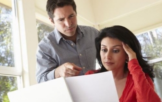 couple reviewing energy bills 12393 500x333