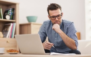 man thinking about company for air conditioner repair 12548 500x333